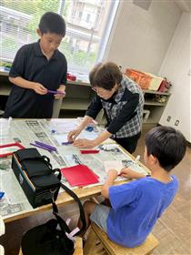 折り紙を巻く